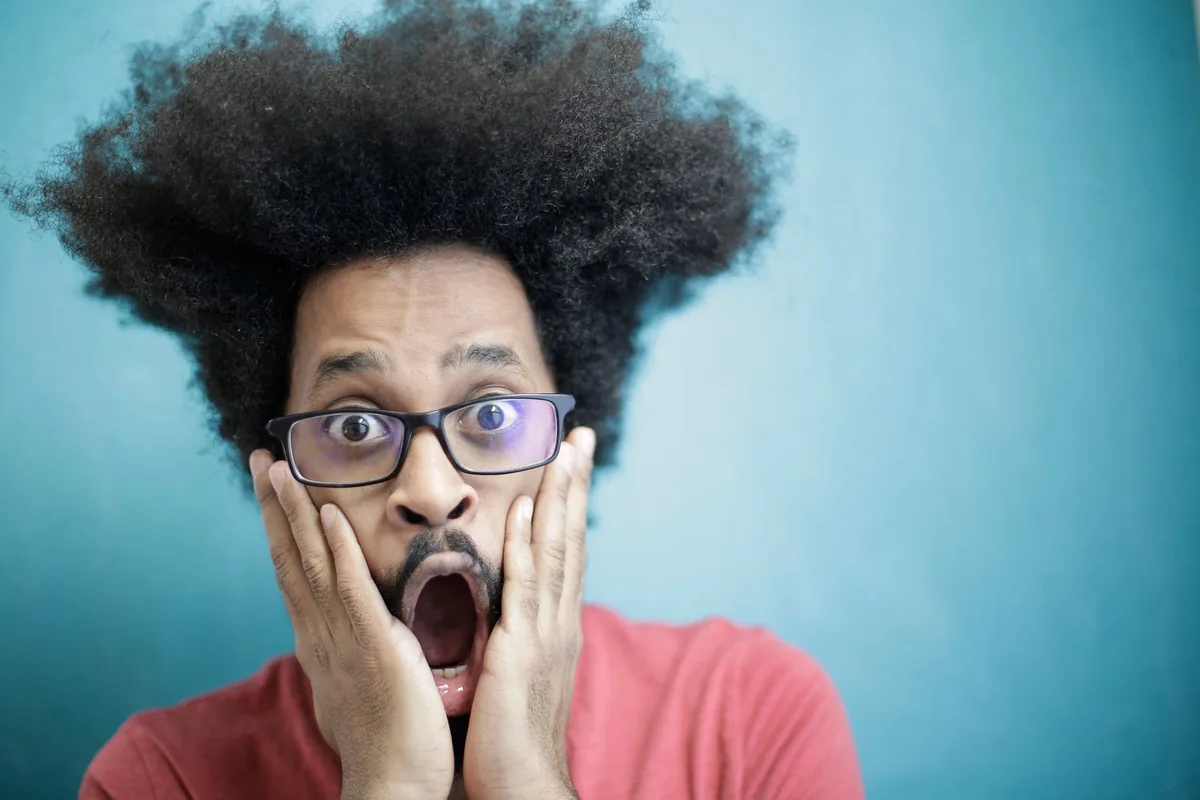A man with a surprised, shocked expression.